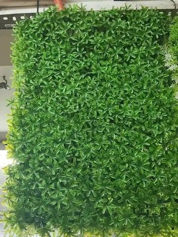 Grass Mat (Category: Artificial Plants & Flowers) located in Manila. Submitted by athennaalampayan (Listing ID 1465205686, Image 2). Description: Lush artificial green plant wall panels. Various leaf styles including ferns, monstera, and succulents. Dense foliage design creates a realistic look. Easy to mount for indoor or outdoor vertical gardens. Great way to bring greenery into any space without maintenance. Multiple panels available with diff