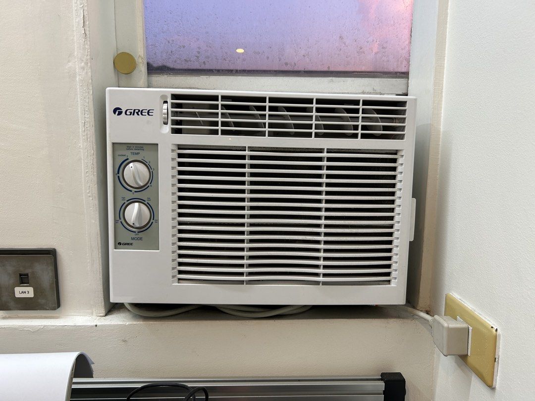 .5 HP GREE Window Air Conditioner with Temperature and Mode Dials (Category: Air Conditioning and Heating) located in Quezon City. Submitted by ccr26 (Listing ID 1465306425, Image 1). Description: VERY SELDOM USED - Brand: GREE Window Air Conditioner - Color: White - Controls: Dual rotary dials for temperature and fan modes - Setup: Fits standard window frames and plugs into regular wall outlets - Condition: Fully functional and ready to use - Id