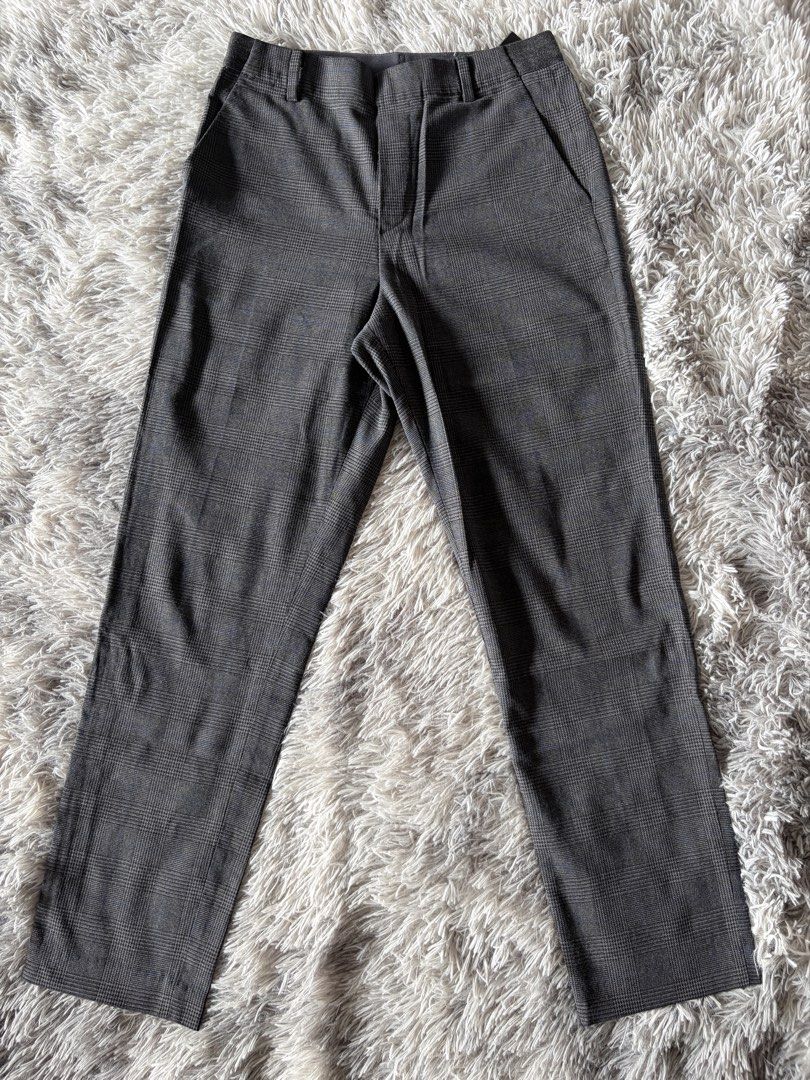 Grey plaid trousers formal pants (Category: Other Bottoms) located in Manila. Submitted by kez0020 (Listing ID 1465225108, Image 1). Description: - Grey plaid trousers with a stylish dark tartan pattern - Regular fit with a comfortable mid-rise waistband and zip fly - Features functional front pockets on both sides - Designed with crisp front leg creases for a sharp, polished look - Versatile piece ideal for office wear or smart casual outfits.