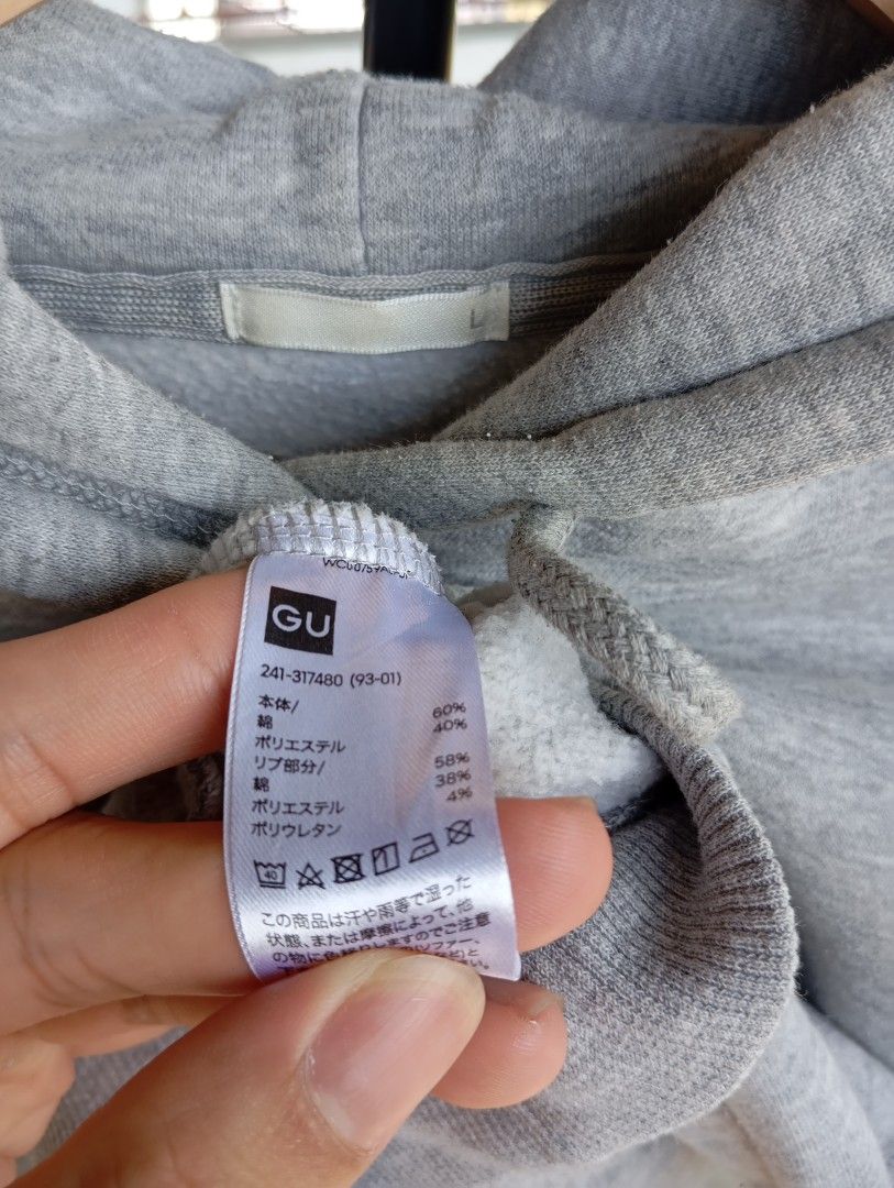 GU Heather Gray Hoodie (Category: Coats, Jackets and Outerwear) located in Mangaldan. Submitted by ig_thriftnidrei (Listing ID 1465221610, Image 2). Description: Width: 21 in Length: 25 in issue: lints (removable) rtw.
