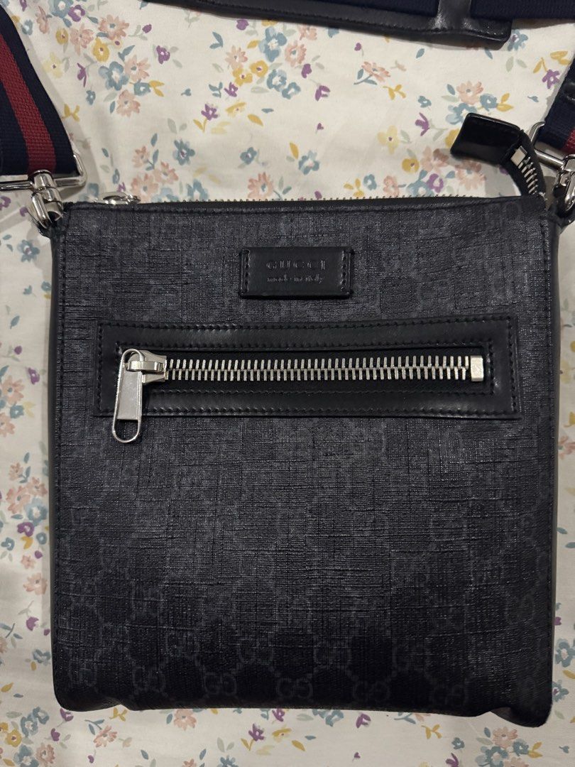 Gucci GG Supreme Black Messenger Bag (Category: Sling Bags) located in Quezon City. Submitted by furious0128 (Listing ID 1465377734, Image 1). Description: - 100% Authentic Gucci messenger bag - Black GG Supreme canvas with leather trim - Front zipped pocket featuring silver hardware - Adjustable blue and red web stripe shoulder strap - Compact and perfect for daily essentials - Clean interior and exterior with minimal signs of wear.
