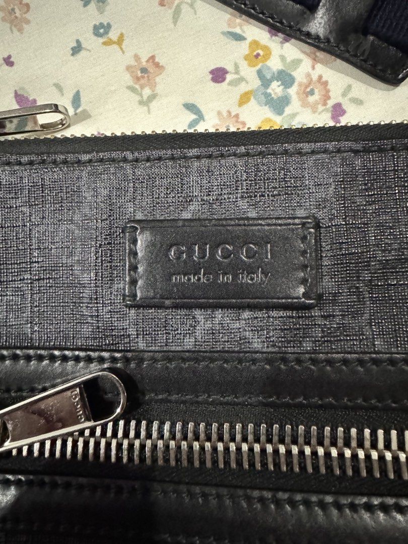 Gucci GG Supreme Black Messenger Bag (Category: Sling Bags) located in Quezon City. Submitted by furious0128 (Listing ID 1465377734, Image 2). Description: - 100% Authentic Gucci messenger bag - Black GG Supreme canvas with leather trim - Front zipped pocket featuring silver hardware - Adjustable blue and red web stripe shoulder strap - Compact and perfect for daily essentials - Clean interior and exterior with minimal signs of wear.