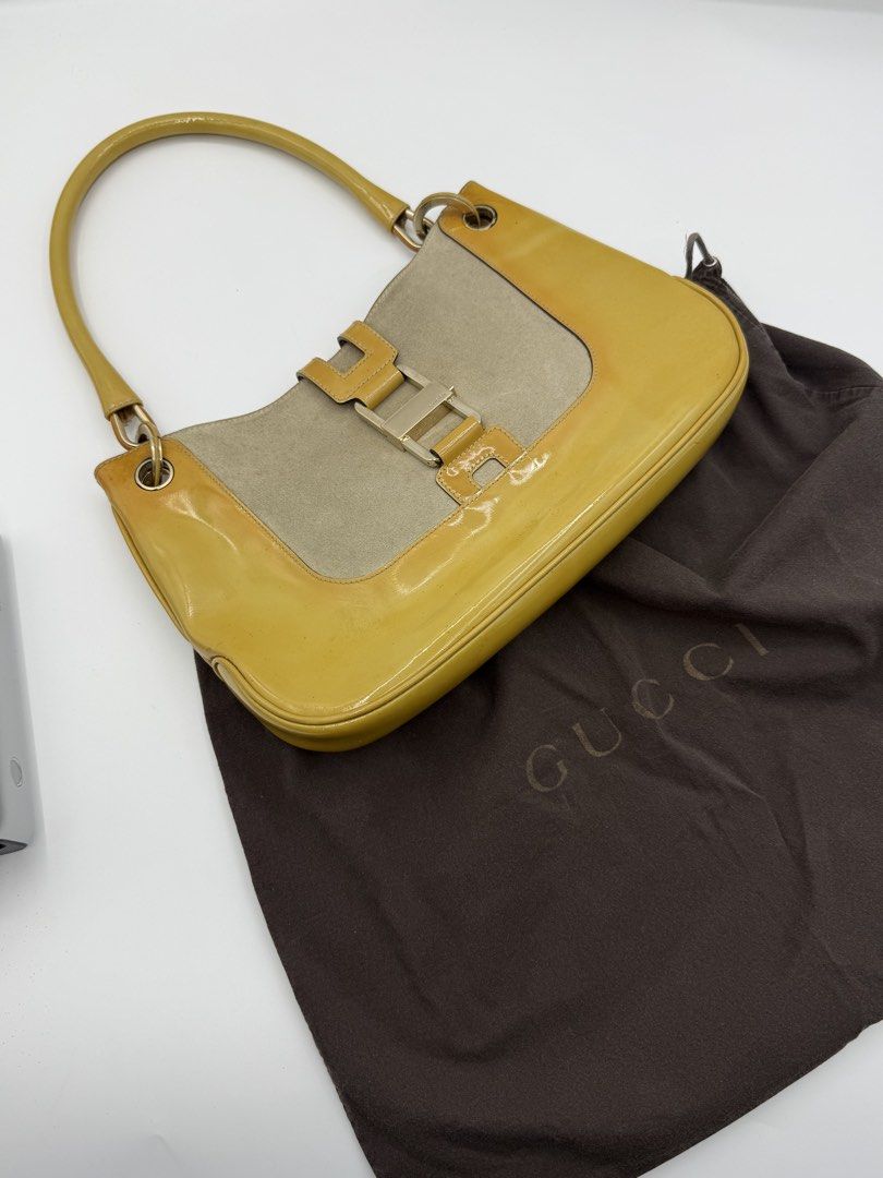 Gucci kili bag (Category: Shoulder Bags) located in Caloocan City. Submitted by rossvault2 (Listing ID 1465233592, Image 2). Description: - Authentic vintage Y2K Gucci shoulder bag - Yellow patent leather and suede exterior with gold-tone hardware - Front buckle closure and single shoulder strap - Monogram fabric interior lining with zipper pocket - Serial number: 001-4150 002058 - Includes original brown Gucci dust bag -normal signs of use/pleas