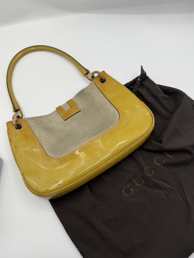 Gucci kili bag (Category: Shoulder Bags) located in Caloocan City. Submitted by rossvault2 (Listing ID 1465233592, Image 3). Description: - Authentic vintage Y2K Gucci shoulder bag - Yellow patent leather and suede exterior with gold-tone hardware - Front buckle closure and single shoulder strap - Monogram fabric interior lining with zipper pocket - Serial number: 001-4150 002058 - Includes original brown Gucci dust bag -normal signs of use/pleas