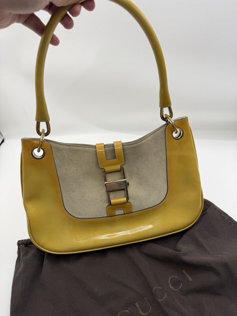 Gucci kili bag (Category: Shoulder Bags) located in Caloocan City. Submitted by rossvault2 (Listing ID 1465233592, Image 1). Description: - Authentic vintage Y2K Gucci shoulder bag - Yellow patent leather and suede exterior with gold-tone hardware - Front buckle closure and single shoulder strap - Monogram fabric interior lining with zipper pocket - Serial number: 001-4150 002058 - Includes original brown Gucci dust bag -normal signs of use/pleas