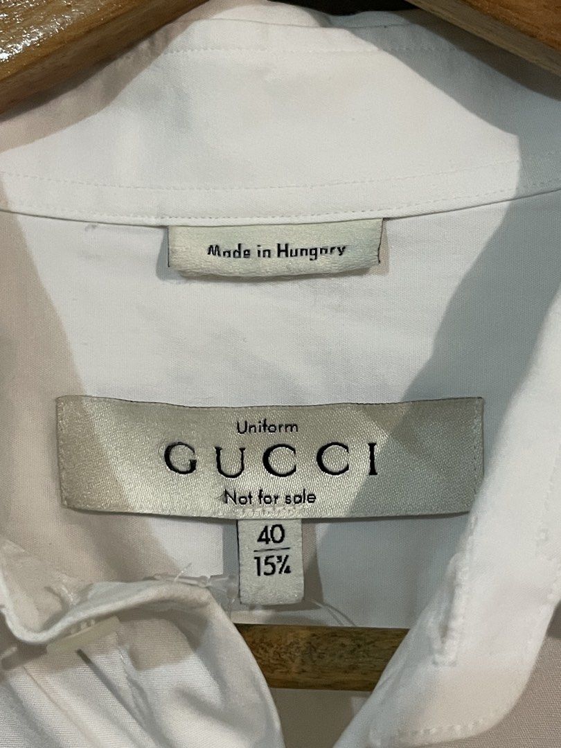 Gucci Polo LongSleeve Uniform (Category: Luxury Apparel) located in Makati City. Submitted by gustavoo28 (Listing ID 1465349659, Image 2). Description: Authentic/Legit Gucci Uniform No Issues Excellent condition like new 10/10 Color rate 21W 29L in inches Check photos for reference .