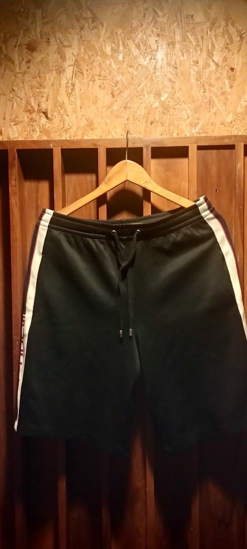Gucci Technical Jersey Black Shorts (Category: Shorts) located in Manila. Submitted by worldgearph (Listing ID 1465271635, Image 1). Description: Gucci track shorts in black. Shorts are in good condition, minimal fluff buttons are still intact jp rizal makati area.