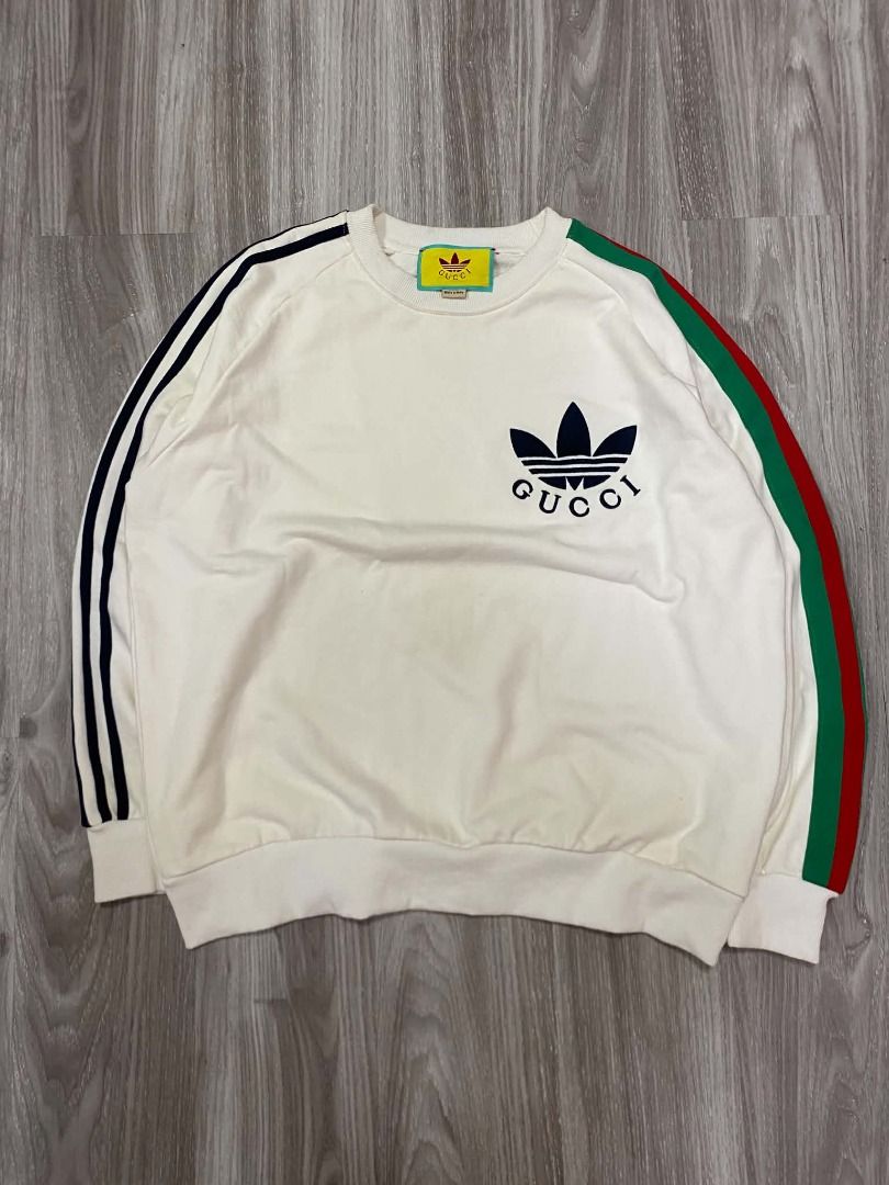 GUCCI X ADIDAS CREWNECK (Category: Coats, Jackets and Outerwear) located in Digos. Submitted by grailz.find (Listing ID 1465193941, Image 1). Description: GUCCI X ADIDAS NO ISSUE SIZE MEDIUM ON TAG.