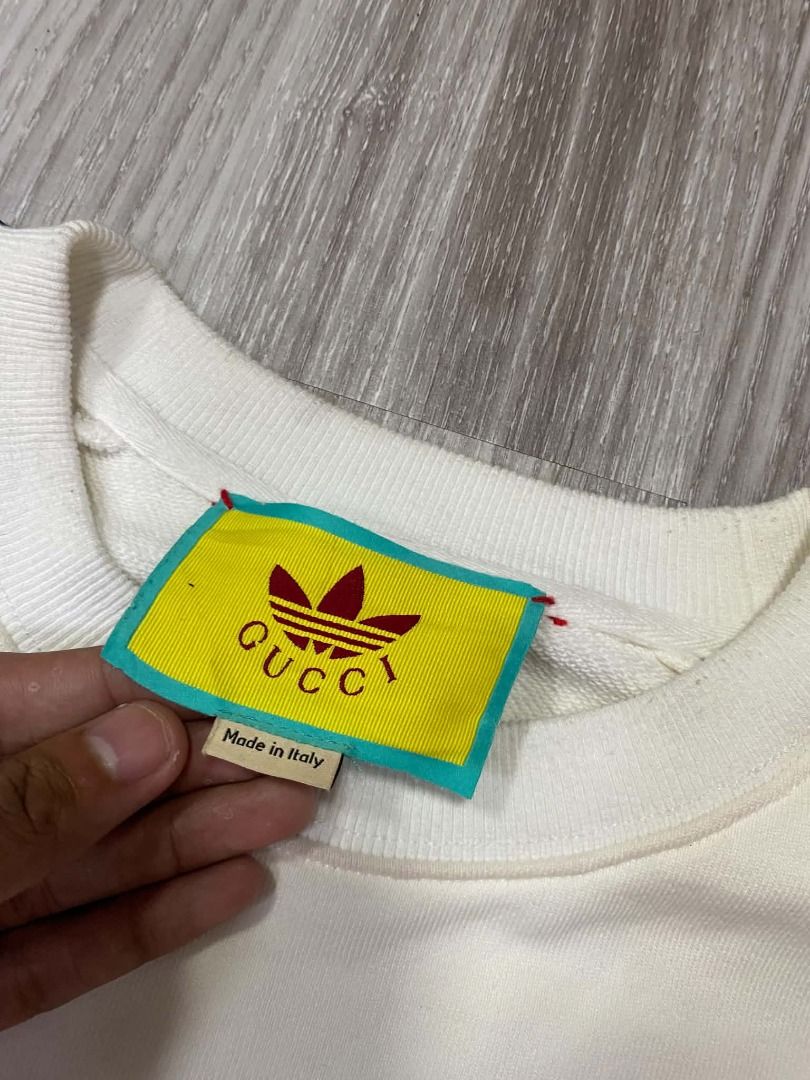GUCCI X ADIDAS CREWNECK (Category: Coats, Jackets and Outerwear) located in Digos. Submitted by grailz.find (Listing ID 1465193941, Image 3). Description: GUCCI X ADIDAS NO ISSUE SIZE MEDIUM ON TAG.