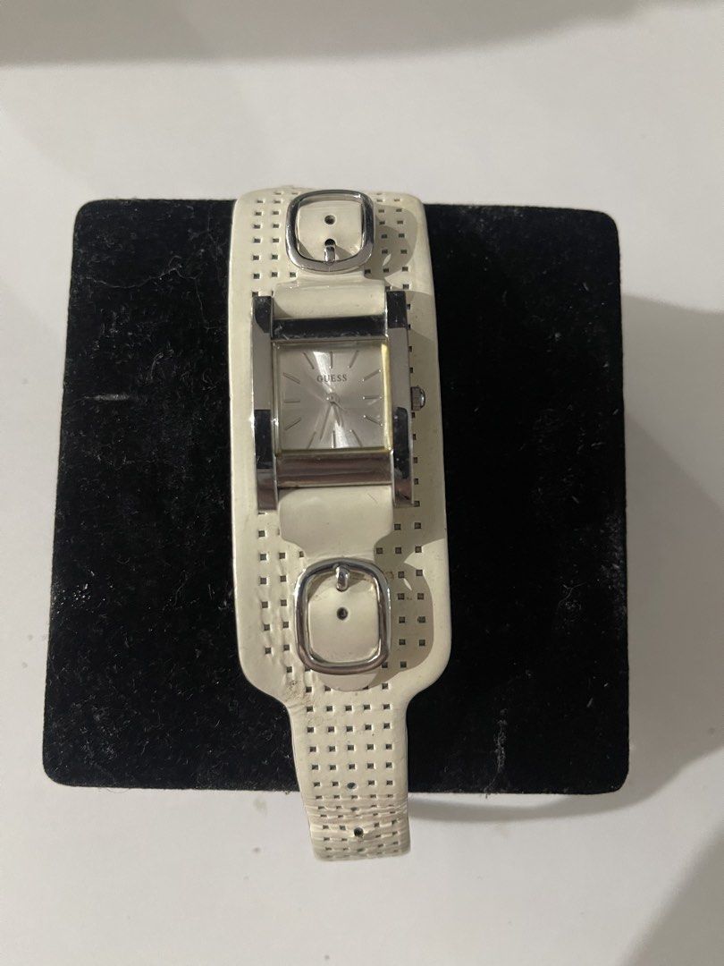 GUESS Silver Rectangular White Leather Cuff/Buckle (Category: Women's Watches) located in Quezon City. Submitted by luckylavishdeclutter (Listing ID 1465268503, Image 1). Description: See pics for authenticity and issues. Need to replace battery (less than 200php in malls) Original leather Slightly nego for sure buyer .