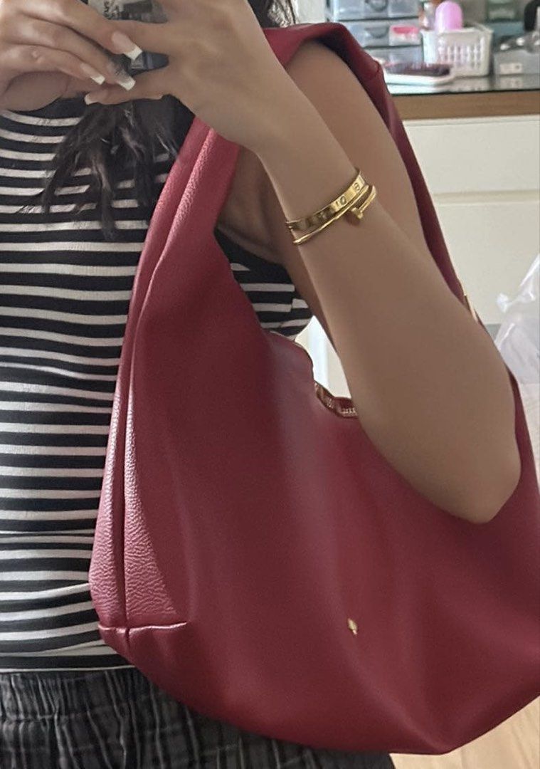 GVN Medium Hobo Bag in CHILI with Box! (Category: Shoulder Bags) located in Manila. Submitted by _foryou (Listing ID 1465313598, Image 2). Description: WITH ORIGINAL BOX good as new !! worn thrice only! super pretty color in actual orig price 2k+.