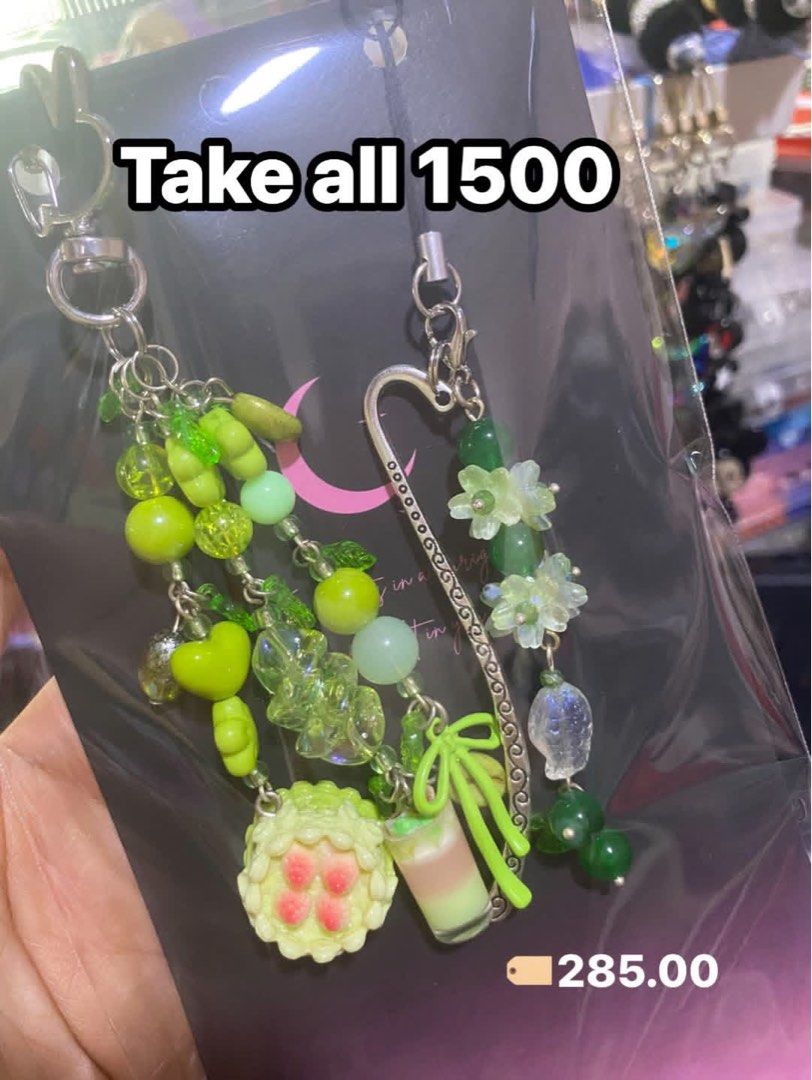 Handmade Totoro Beaded Keychain and Bookmark Set (Category: Charms) located in Tanauan. Submitted by mariacraftcorner (Listing ID 1465308985, Image 1). Description: - Handmade multi-colored beaded charms featuring adorable Totoro characters, soot sprites, cherries, flowers, and tiny drinks - Multi-functional: use as a bag charm, key chain, or attach the included metal bookmark hook for reading - Price: ₱285 each or ₱1,500 for the complete set.