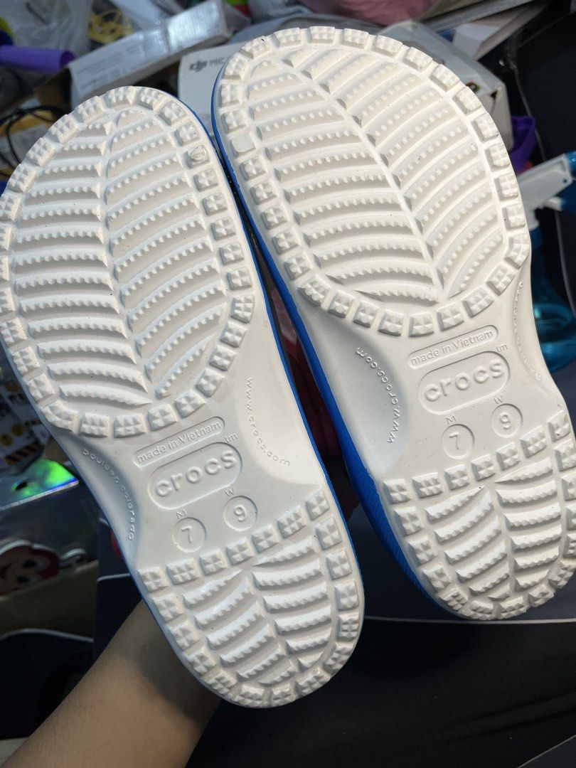 Hello Kitty Crocs Clogs White Red Blue Size M7 W9 (Category: Slippers and slides) located in Manila. Submitted by abbigail029. (Listing ID 1465201654, Image 3). Description: - Brand new with tags, never worn - Color: White with red strap and blue sole - Size: Men's 7 / Women's 9 - Features adorable red bow Jibbitz charms and Kitty side figure - Cute Kitty graphic printed inside the footbed - Perfect for Sanrio fans and daily wear.
