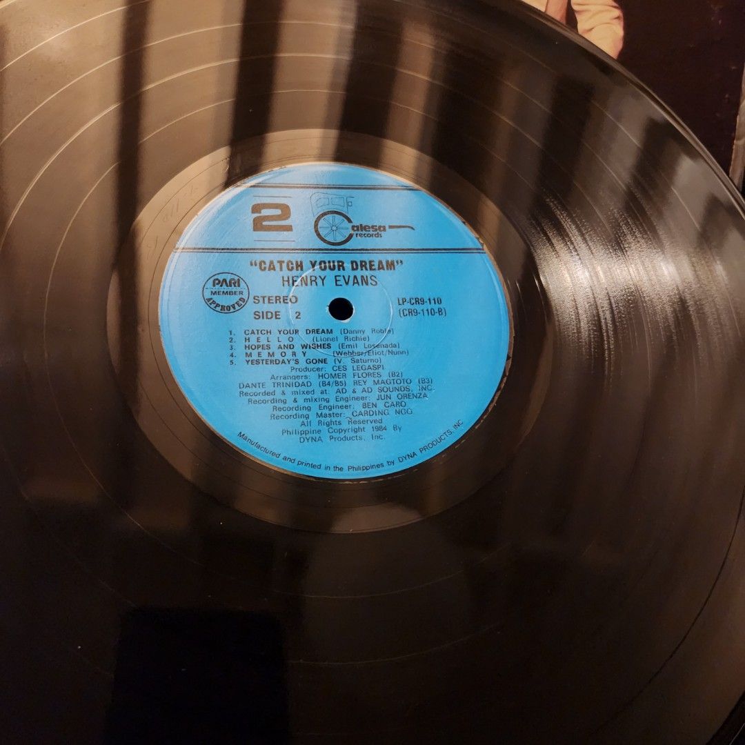 Henry Evans Catch Your Dream Vinyl Record LP (Category: Vinyls) located in Caloocan City. Submitted by Secondhand_Sureshots (Listing ID 1465275832, Image 3). Description: - Artist & Album: Henry Evans - Catch Your Dream - Label & Format: Alesa Records, Stereo, Side 1, Blue Label - Manufacturing: Made in the Philippines by Dyna Products, Inc. (1984) - Tracklist: Must Have You, In Your Eyes, You, You And Why, Tell Me Why - Condition Note: Has tape 