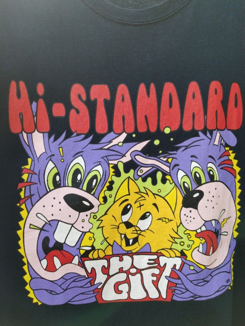Hi-Standard (Category: Tshirts & Polo Shirts ) located in Legazpi City. Submitted by genobecollectives (Listing ID 1465173175, Image 3). Description: hi-standard tour shirt 1200 free ship - Design: The Gift album graphic with cartoon dog and cat illustrations - Color: Solid Black - Material: 100% Cotton - Size: Large (Regular Fit) 22 x 29 - Origin: Planned and printed in Japan, made in Haiti -very good condition my crack lng sa ibang part ng prin