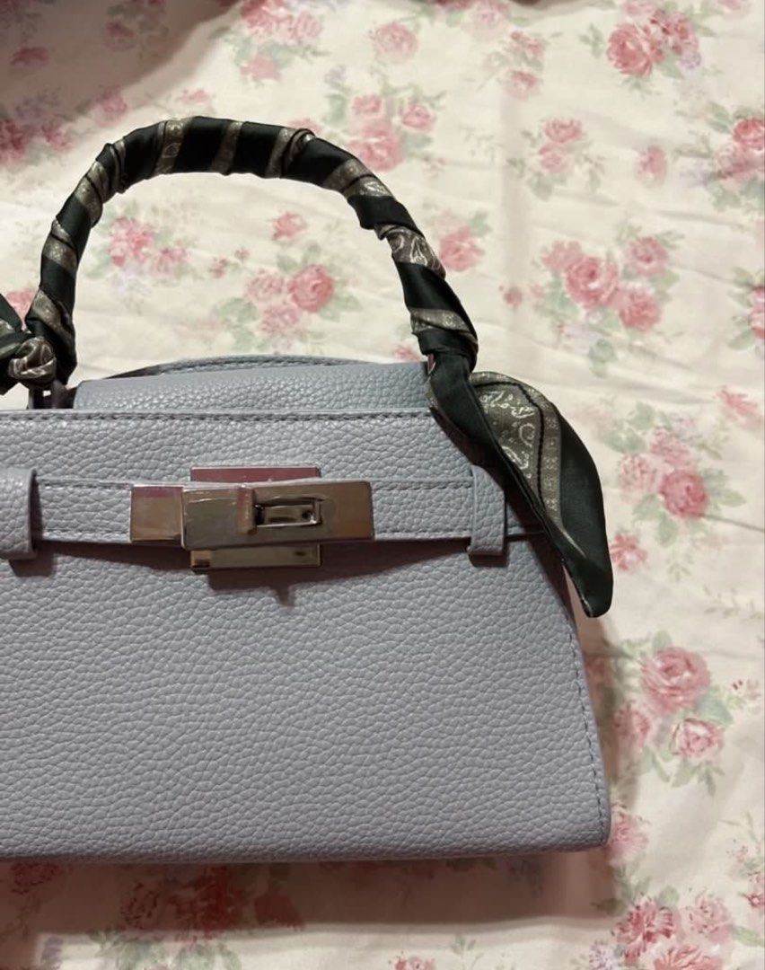 H&M blue grey purse (Category: Shoulder Bags) located in Davao. Submitted by saintneedscash (Listing ID 1465225466, Image 2). Description: -never been used, impulsive purchase -bought for around 2k on h&m .