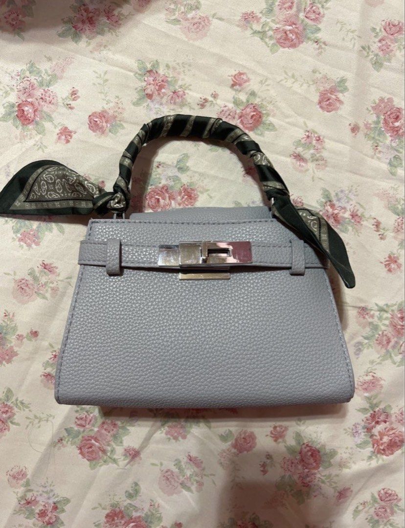 H&M blue grey purse (Category: Shoulder Bags) located in Davao. Submitted by saintneedscash (Listing ID 1465225466, Image 1). Description: -never been used, impulsive purchase -bought for around 2k on h&m .
