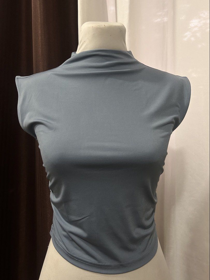 H&M Blue Mock Neck Sleeveless Top (Category: Sleeveless) located in Mandaluyong City. Submitted by namicartz (Listing ID 1465207200, Image 1). Description: - size: S (tags intact) - comfortable, somewhat stretchy fabric - items are well taken care of but still used, please manage your expectations - feel free to ask for more photos or questions by messaging! MOP: Gcash, Maribank, BDO MOD: SDD, J&T, or Meet up.