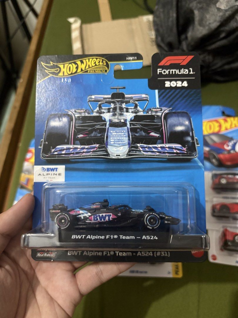 Hot Wheels Formula 1 2024 BWT Alpine A524 #31 (Category: Vehicle & Diecast Models) located in Manila. Submitted by dominicoab75406 (Listing ID 1465199938, Image 1). Description: - Brand: Hot Wheels Premium - Model: 2024 Formula 1 BWT Alpine A524 (#31) - Condition: Brand new, carded in original blister pack - Features: Real Riders wheels, stunning blue livery with pink accents - Perfect for: F1 fans and diecast collectors.