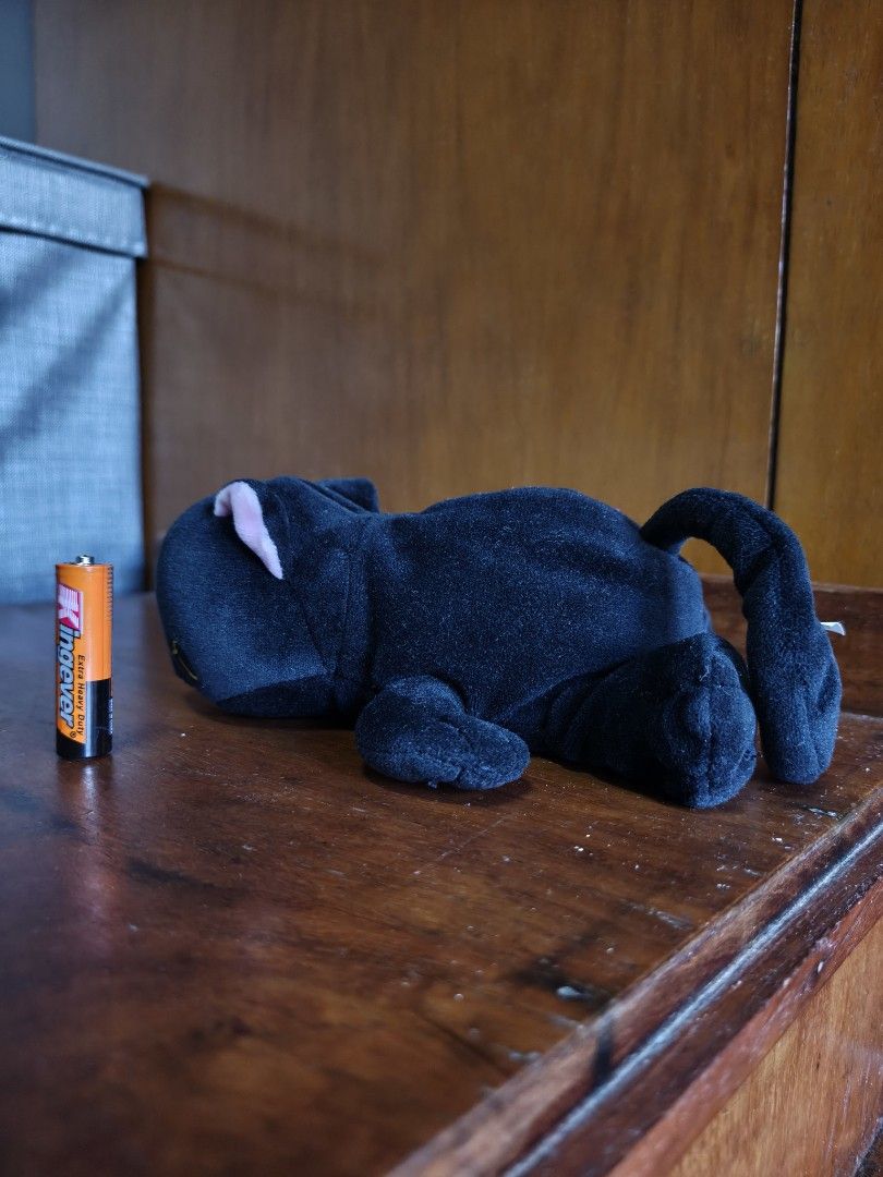 Hug-A-Lump weighted plush Luna (Category: Plushies & Soft Toys) located in Rizal. Submitted by kencamara (Listing ID 1465253655, Image 2). Description: - Adorable black cat plush toy in a lying position - Ultra-soft fabric with a sweet pink nose and inner ears - Detailed embroidered yellow eyes and stitched paws - Long curved tail for an extra cute look - Clean surface, no stains, rips, or tears - Perfect as a gift, toy, or cute room decor piece.