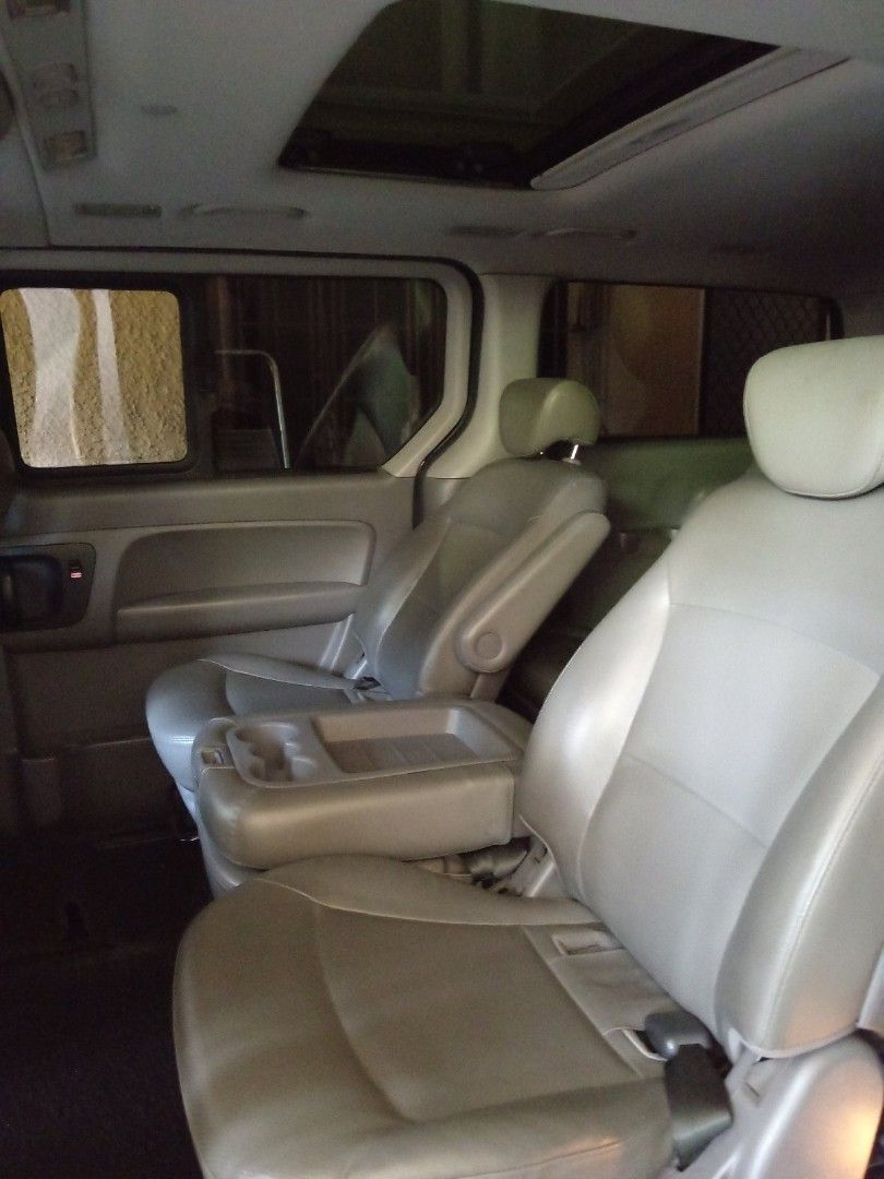 Hyundai Starex (Category: Used Cars) located in Quezon City. Submitted by royal.advantprop (Listing ID 1465207878, Image 2). Description: Cvx limited, copper tone color, dual sunroof moonroof, 9 seater to 12 seater Hancars acquired.