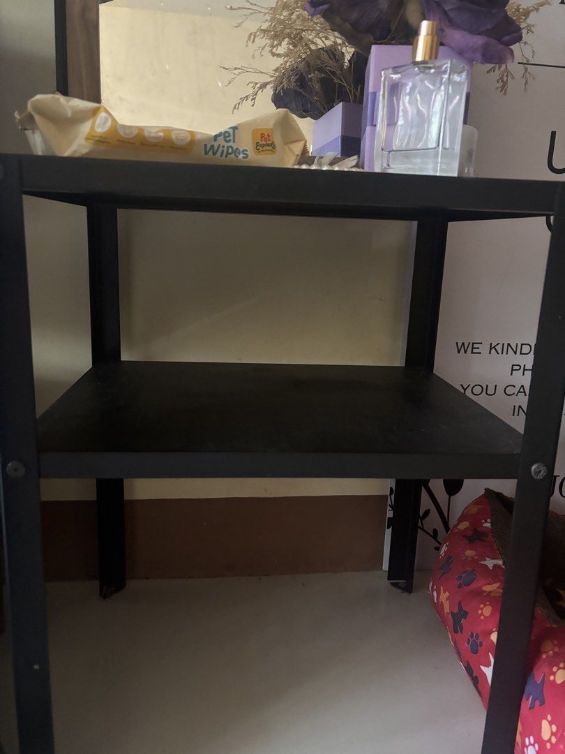 IKEA KNARREVIK Black Nightstand Bedside Table (Category: Shelves, Cabinets & Racks) located in Manila. Submitted by jobithings (Listing ID 1465196501, Image 2). Description: - Brand: IKEA KNARREVIK - Color: Sleek black - Dimensions: 37 x 28 x 45 cm - Features: Two sturdy metal shelves - Condition: Clean, well-maintained - Perfect for: Small spaces, tight corners, and compact bedrooms - Fulfillment: Pick up or local delivery arranged.
