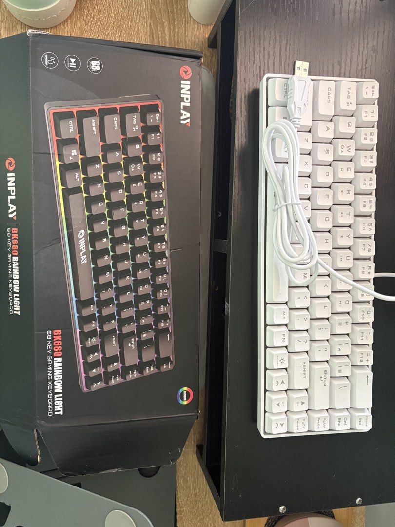 Inplay BK680 Rainbow Light 68 Key Gaming Keyboard White (Category: Computer Keyboard) located in Pasig City. Submitted by grumpycat15 (Listing ID 1465190387, Image 1). Description: - Model: Inplay BK680 68-key gaming keyboard (White) - Condition: Unused, opened only for checking - Layout: Compact 68-key design to save desk space - Lighting: Vibrant rainbow lighting effects - Connectivity: Wired setup with a convenient detachable cable - Inclusion