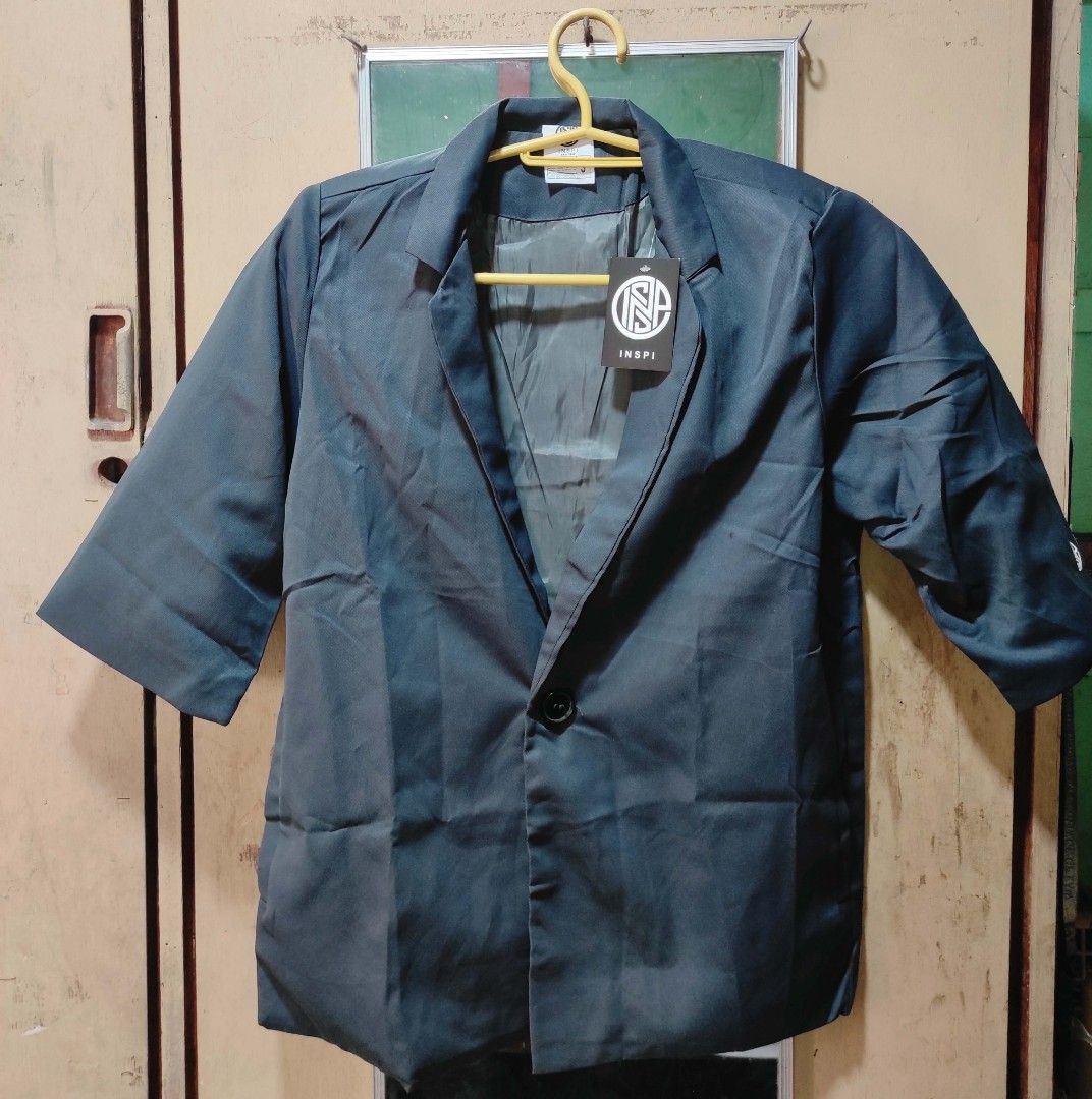 Inspi Dark Grey 3/4 Sleeve Blazer (Category: Coats, Jackets and Outerwear) located in Laoag. Submitted by pa-010 (Listing ID 1465234339, Image 1). Description: INSPI Coat Blazer Dark Gray (Not Navy Blue) Size Small (Width: 19", Length: 26", Sleeves: 14") Ideally for smaller body frames With Notched Collar, 3/4 Sleeve & Single Button With Inside Pocket Suitable for office and daily look Made with Twill Fabric Location: Ilocos Norte MOP: PNB/GCASH 