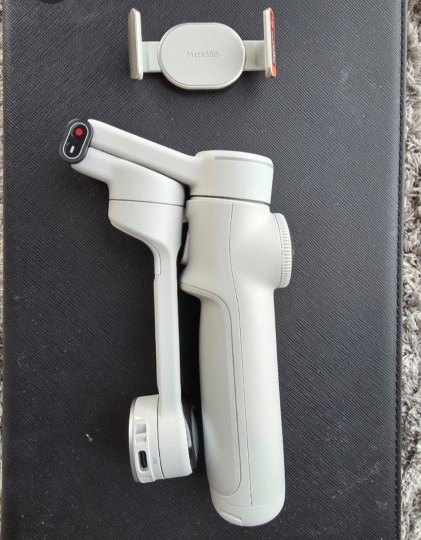 Insta360 Flow Smartphone Stabilizer with Carry Case (Category: Gimbals & Stabilizers ) located in Quezon City. Submitted by dad_brio (Listing ID 1465373041, Image 2). Description: - Model: Insta360 Flow smartphone gimbal stabilizer - Condition: Fully functional and clean unit - Portability: Folds down compact for easy travel - Inclusions: Magnetic phone clamp included - Extras: Custom-fit grey carrying case with adjustable shoulder strap.