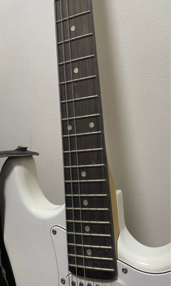 Irin White Electric Guitar with Accessories Bundle (Category: Musical Instruments) located in Manila. Submitted by kingsophi3 (Listing ID 1465233070, Image 3). Description: -Included: Guitar, strap, IRIN clip-on tuner, brand new pack of strings, whammy bar, adjustment wrenches, and picks.