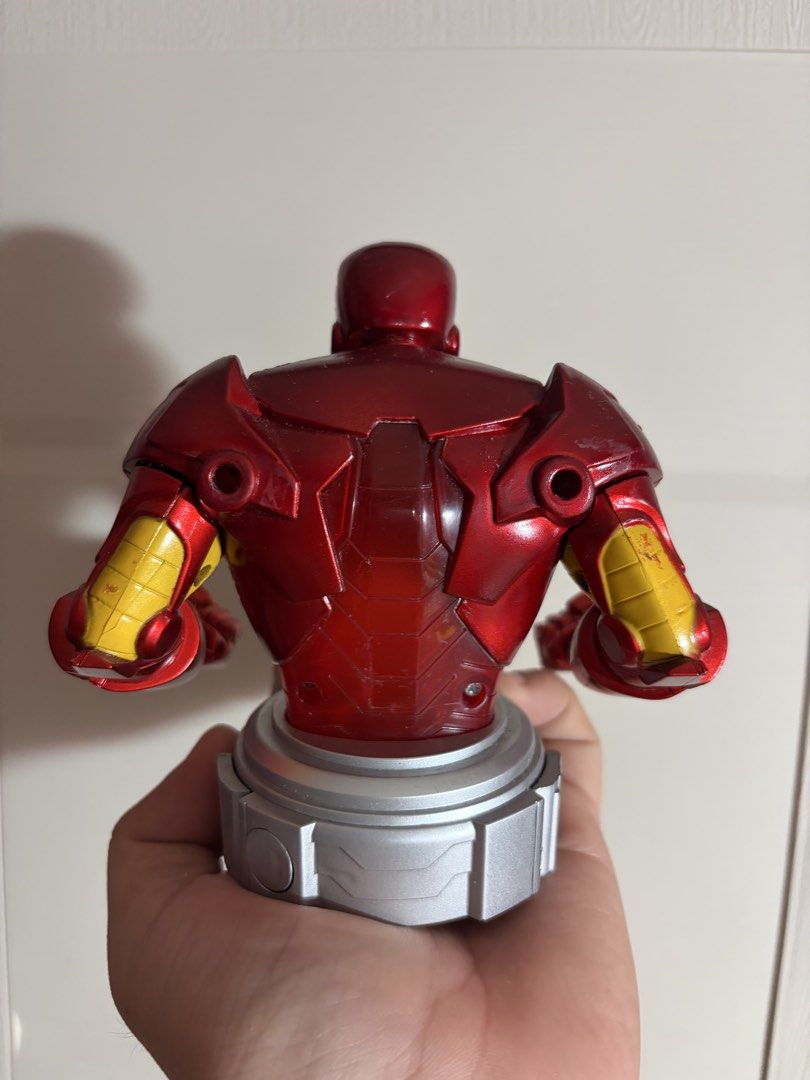 Iron Man Bust Tech 4 Kids 2012 Marvel (Category: Figurines & Statues) located in Plaridel. Submitted by moddedjarvis (Listing ID 1465171442, Image 2). Description: - Light not working. As is. - Item: 2012 Tech 4 Kids Iron Man Collectible Bust - Design: Classic red and gold armor with a silver display base - Condition: Minor scuffs and paint wear on the mask and shoulders; stands sturdily on its own - Perfect for: Marvel fans and desk display.