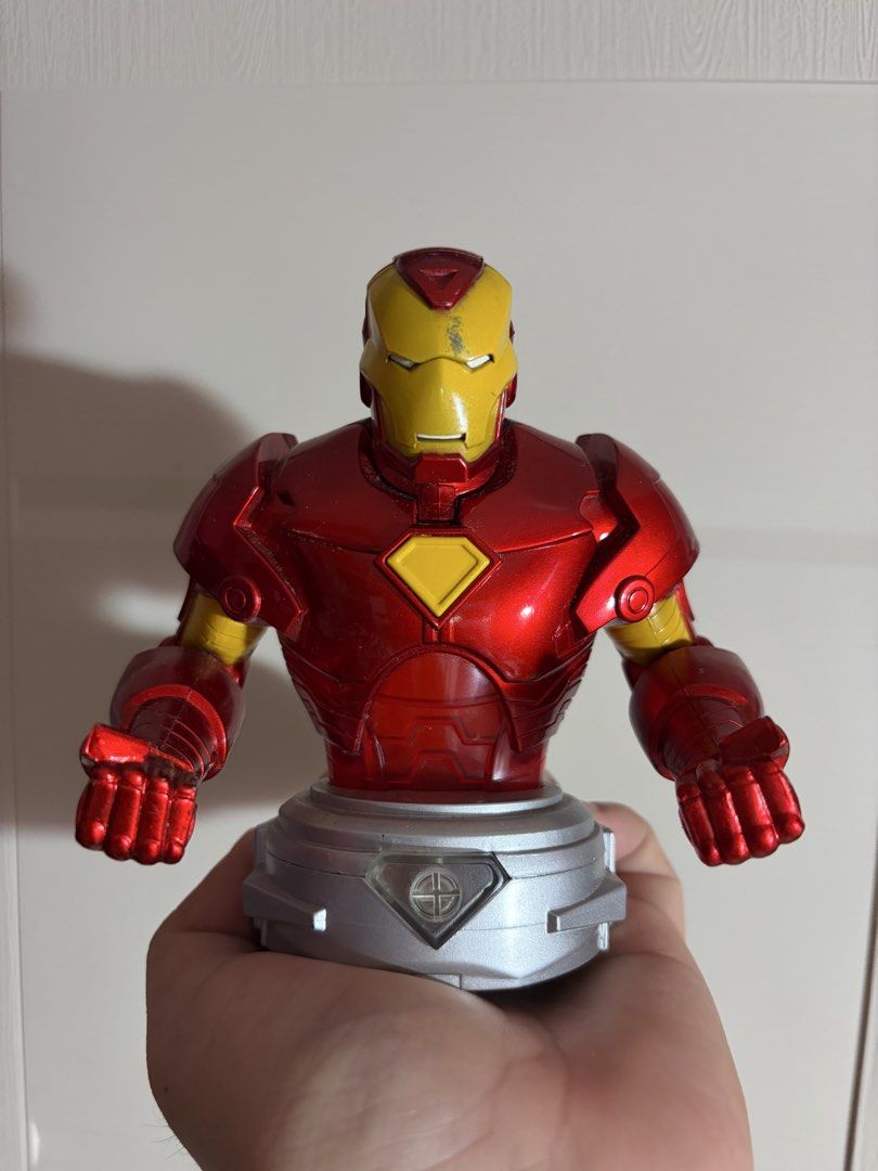 Iron Man Bust Tech 4 Kids 2012 Marvel (Category: Figurines & Statues) located in Plaridel. Submitted by moddedjarvis (Listing ID 1465171442, Image 1). Description: - Light not working. As is. - Item: 2012 Tech 4 Kids Iron Man Collectible Bust - Design: Classic red and gold armor with a silver display base - Condition: Minor scuffs and paint wear on the mask and shoulders; stands sturdily on its own - Perfect for: Marvel fans and desk display.