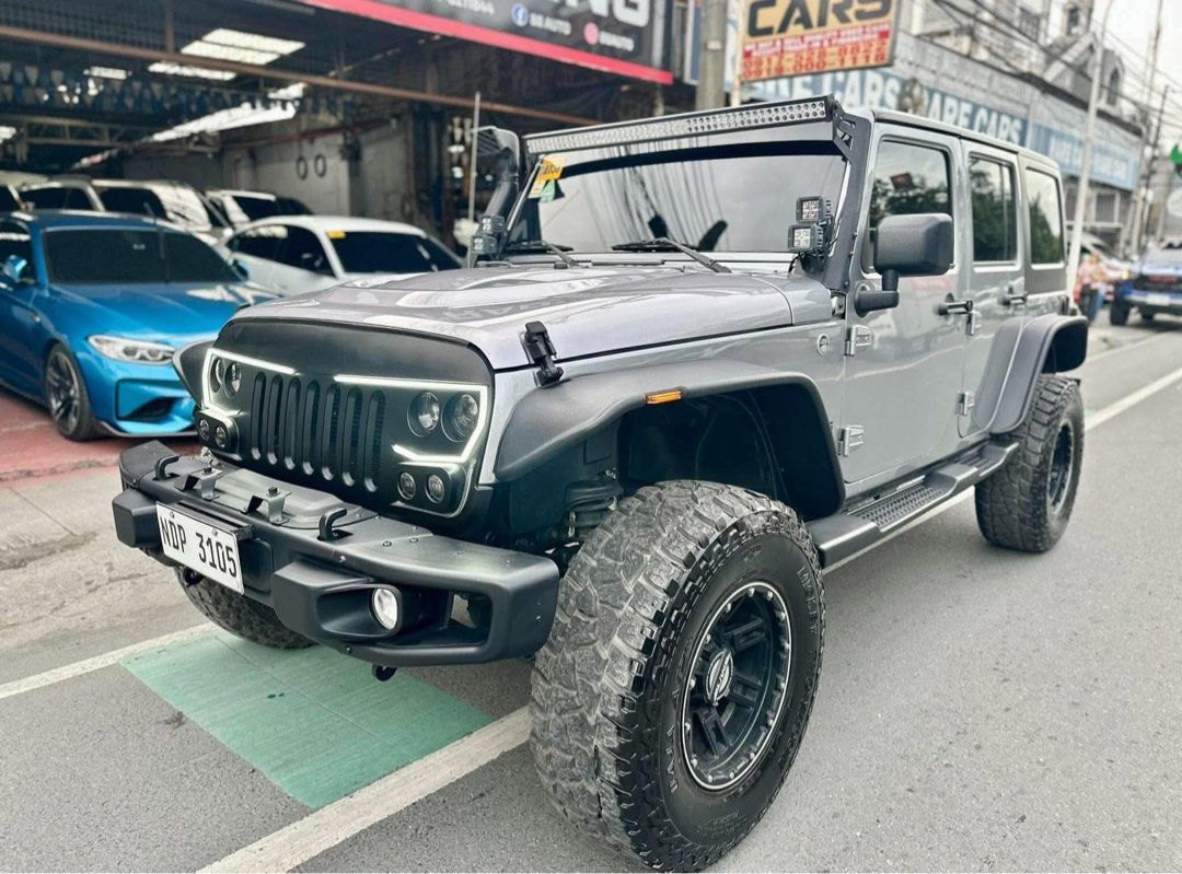 Jeep Wrangler 4x4 Auto (Category: Used Cars) located in Manila. Submitted by quality_cars (Listing ID 1465355618, Image 1). Description: 2019 Jeep Wrangler 4x4 Price: ₱2.195m ✅ FINANCING IN HOUSE & BANK ✅ TRADE IN ‼️ 5tkm LOWEST MILEAGE IN THE MARKET ‼️ FULLY LOADED - BRAND NEW CONDITION ‼️ CAR SHOW QUALITY 2019 June Acquired 5tkm+ LOW ORIGINAL MILEAGE - dare to scan Automatic Transmission 3.6L V6 Gas Engine Mickey Thompson Set of Mags and Tires 