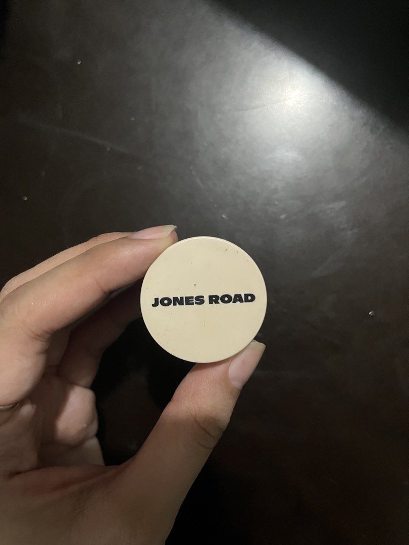 Jones Road Just A Sec Eyeshadow Cool Brown (Category: Makeup) located in Makati City. Submitted by byamary (Listing ID 1465309634, Image 3). Description: - Brand/Item: Jones Road Just A Sec Eyeshadow - Shade: Cool Brown (shimmering neutral brown) - Size: 3.0g / 0.10oz (Full size in glass jar with screw-on lid) - Condition: Barely touched, almost full - Details: Batch and manufacturing info on bottom label.