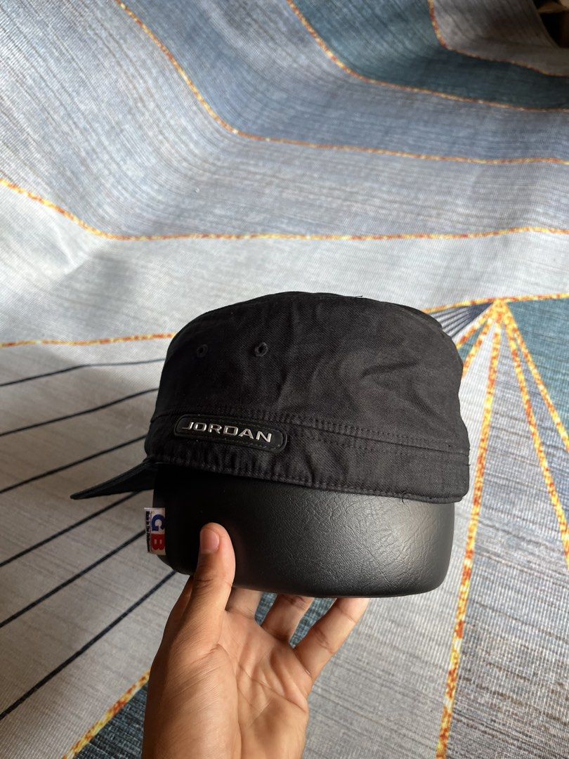Jordan Black Cadet Hat Cap (Category: Caps & Hats) located in Puerto Princesa. Submitted by dijaydj28 (Listing ID 1465326045, Image 2). Description: - Authentic Black Jordan cadet cap - Embroidered Jumpman logo on the front - Jordan text on a rubber badge at the back - Satin-like inner lining with original tags intact - Classic military style with a short brim.