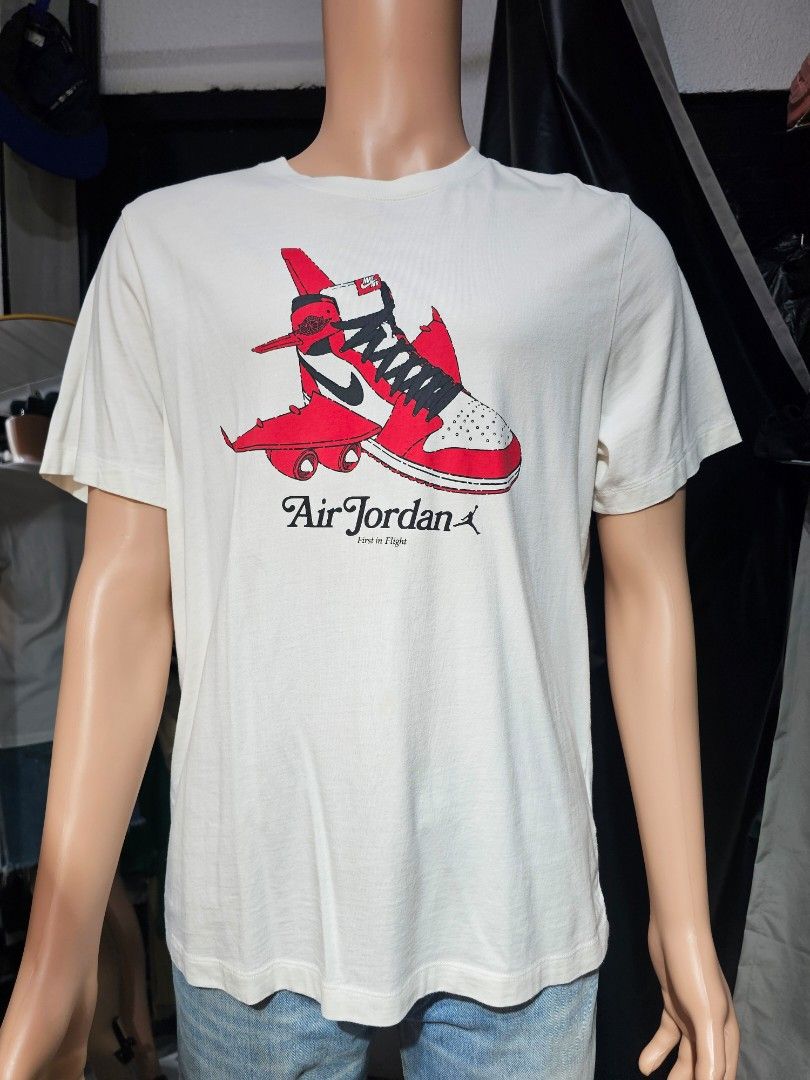 Jordan Graphic SS Crew (Category: Tshirts & Polo Shirts ) located in Baguio. Submitted by kayeonlineshop (Listing ID 1465187510, Image 2). Description: -white Jordan Brand Graphic SS Crew (style code CN3596-100) featuring a playful "First in Flight" graphic that turns an Air Jordan 1 Chicago sneaker into an airplane. -measurements included in the photos.