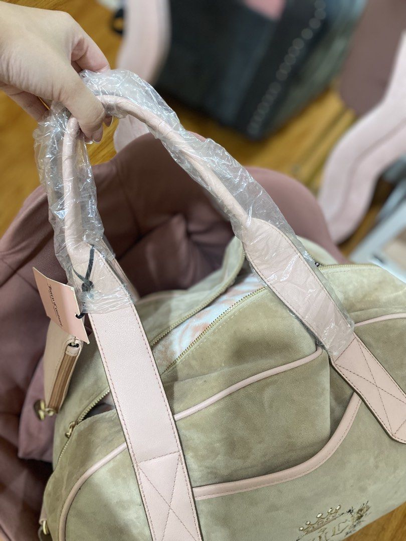 Juicy Couture Duffle Bag (Category: Luxury Bags & Wallets) located in Manila. Submitted by rgpsmu_18 (Listing ID 1465361339, Image 2). Description: WYSIWYG •w/strap, tag and mini pouch • bought it for 4K+ •need cleaning •sealed ( plastic still intact ) •has small stains/marks on the bag •zipper is broken and may need repair •no issue inside • pls check all photos carefully for the actual condition • can consider offers, but only from sure buyers 