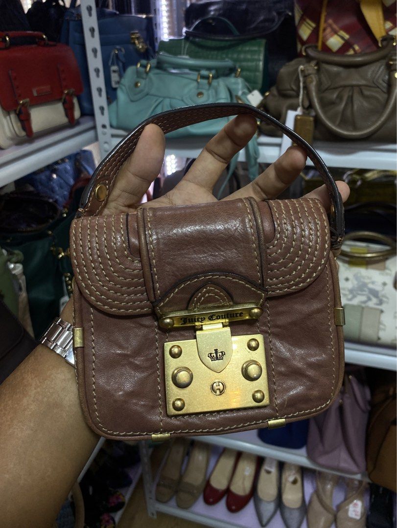 Juicy Couture Leather Mini Bag (Category: Purses & Pouches) located in Davao. Submitted by workmensph (Listing ID 1465286949, Image 1). Description: Very Good Condition.