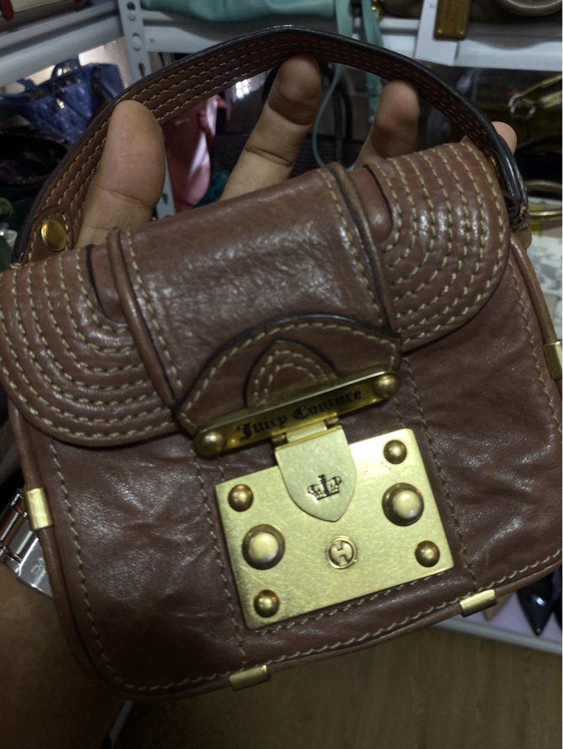 Juicy Couture Leather Mini Bag (Category: Purses & Pouches) located in Davao. Submitted by workmensph (Listing ID 1465286949, Image 2). Description: Very Good Condition.