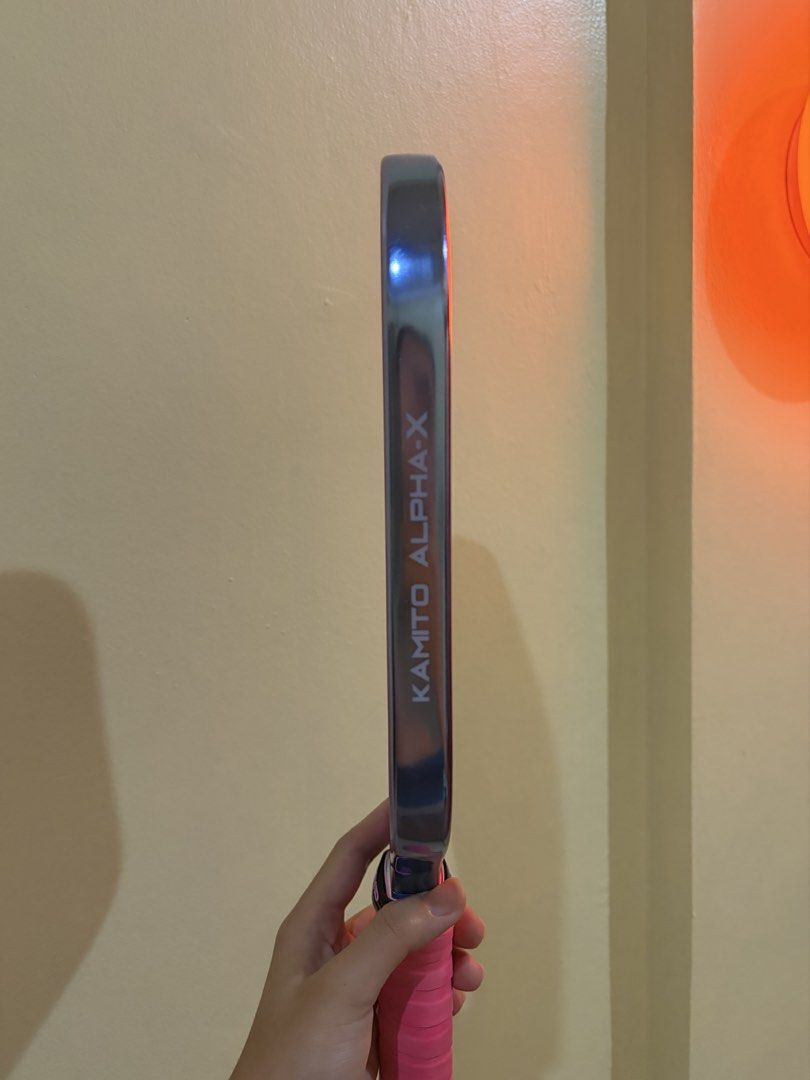 Kamito Alpha X (Category: Racket and Ball Sports) located in Marikina City. Submitted by rxytn (Listing ID 1465375291, Image 2). Description: 🎀 SELLING MY KAMITO ALPHA X CARBON TORAY 16MM! 🎀 Color: Her Power Pink 💗 ✨ Used only 3x ✨ Carbon Toray | 16mm ✨ Installed grip + 1 extra grip ✨ Protective edge tape already installed ✨ Comes with paddle bag ✨ Includes paddle cleaner ✨ Very good condition — lightly used! Ready for its new owner! 🎀🏓 🤝🏻
