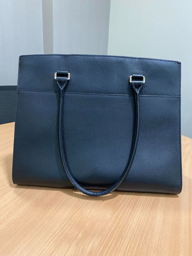 Kate Spade black leather tote handbag (Category: Tote Bags) located in Pasig City. Submitted by dianads1129 (Listing ID 1465248451, Image 2). Description: -FOR SALE: Authentic Kate Spade Grove Street Caley Satchel Bag 🖤✨ Color: Black with Gold-Tone Hardware PRODUCT DETAILS: • Material: Durable boarskin-embossed cowhide leather • Color: Classic Black (madaling ibagay sa kahit anong kulay ng damit) • Hardware: Gold-tone hardware accents at Kate Sp