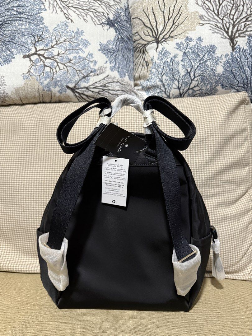Kate Spade Chelsea Medium Backpack Black (Category: Backpacks) located in Quezon City. Submitted by gel.cortez (Listing ID 1465217446, Image 2). Description: - Brand: Kate Spade - Model: Chelsea Medium Backpack - Color: Classic Black - Material: Durable nylon with signature lining - Features: Secure zipper closure, handy front pocket, and multiple interior pockets for organization - Comfort: Adjustable shoulder straps and top handle - Condition: 