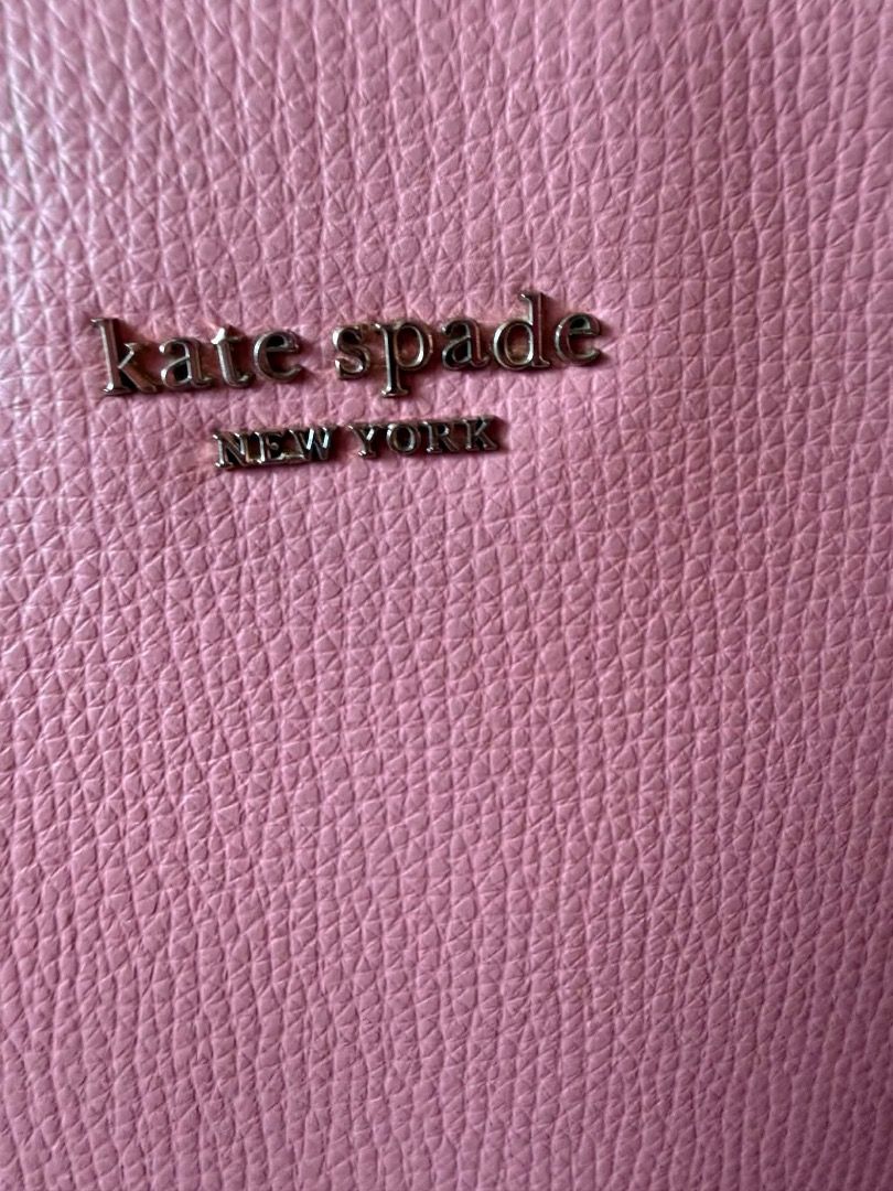 Kate Spade Dome Crossbody Bag Pink (Category: Cross-body Bags) located in San Pedro. Submitted by silverlion-4d46 (Listing ID 1465210653, Image 2). Description: - Brand: Kate Spade New York - Color: Bright Pink - Material: Structured leather with gold foil logo - Closure: Secure top zipper - Strap: Long, adjustable crossbody strap - Capacity: Everyday size fits phone, keys, and wallet - Condition: 100% authentic and well-maintained.