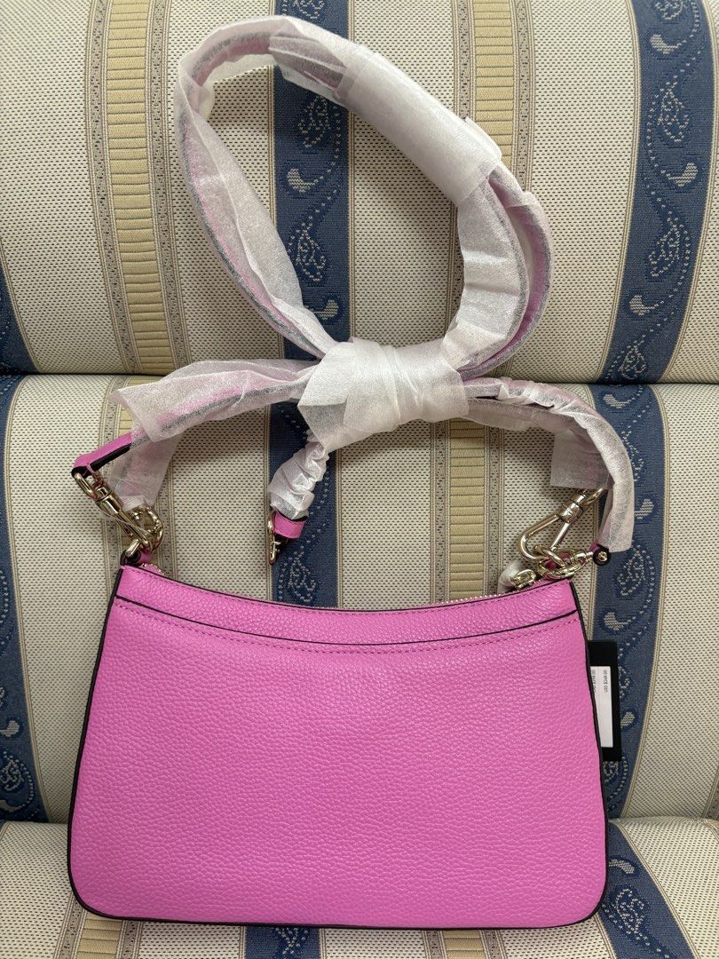 Kate Spade Hudson Pebbled Leather Shoulder Bag Echinacea (Category: Shoulder Bags) located in Pasig City. Submitted by allsalecad (Listing ID 1465174886, Image 2). Description: - Brand: Kate Spade - Model: KF859 - Color: Echinacea (Bright Pink) - Material: Pebbled Leather - Hardware: Gold-tone - Condition: Brand new with original tags (Retail USD $248) - Features: Front zip pocket with metal logo plaque, secure top zipper closure - Strap: Include