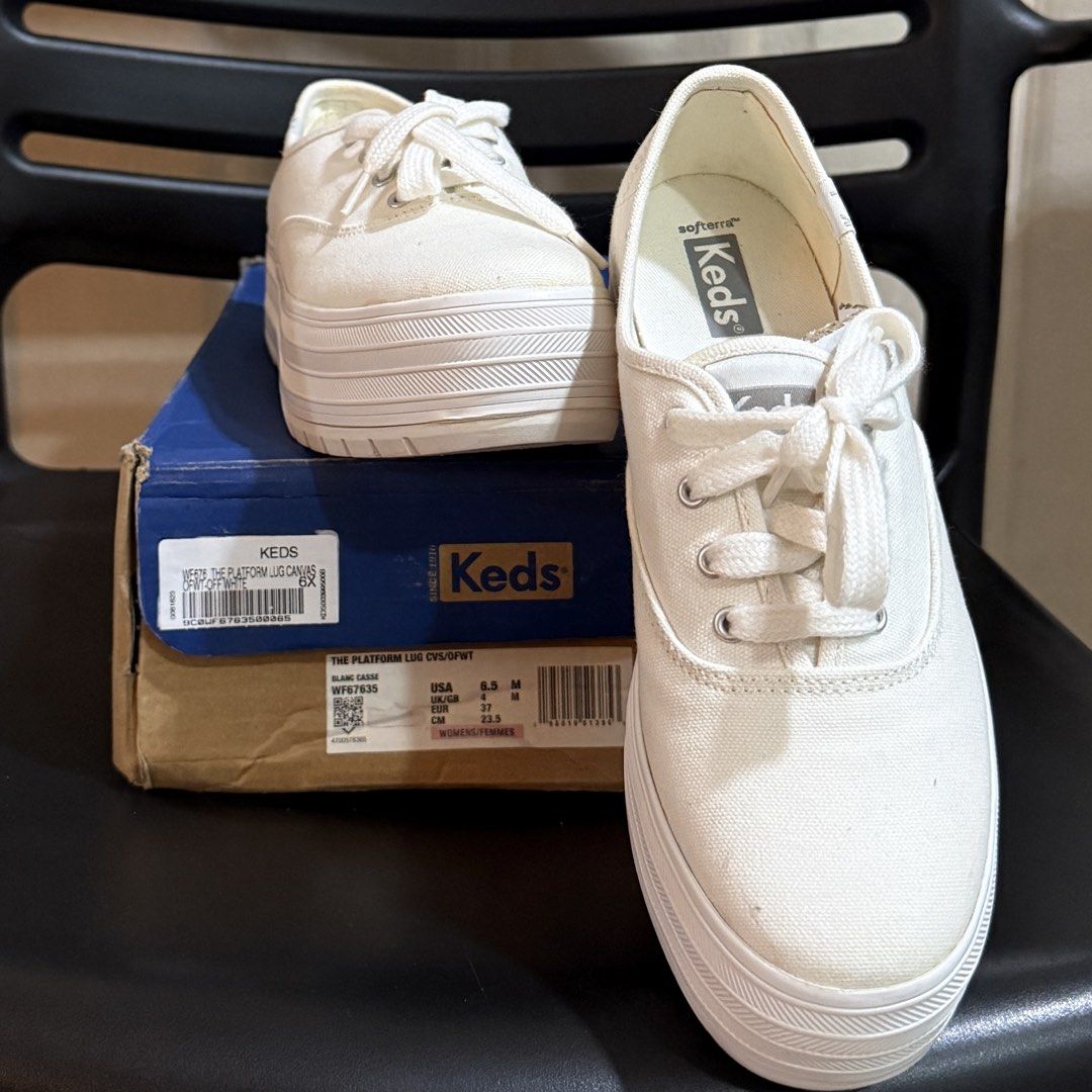 Keds The Platform Lug Canvas Off White Sneakers (Category: Sneakers) located in Makati City. Submitted by julyco. (Listing ID 1465359636, Image 2). Description: - Brand: Keds - Style: Platform lug canvas sneakers - Color: Off-white - Size: US 6.5 / UK 4 / EUR 37 / CM 23.5 - Condition: Brand new, clean, and unworn - Features: Chunky ribbed sole for extra height, classic lace-up design with metal eyelets - Inclusion: Original blue and brown shoebox