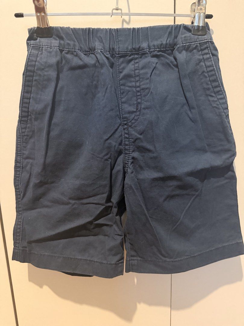 Kids Casual Shorts Bundle Navy Khaki (Category: Babies & Kids Fashion) located in Las Pinas. Submitted by kleoshop24 (Listing ID 1465211841, Image 1). Description: - Bundle includes 2 pairs of versatile kids' casual shorts - Navy blue pair: features an elastic waistband and side pockets for easy pull-on - Khaki beige pair: *Missing button - features belt loops, front button closure, and pockets - Material: Comfortable cotton blend, ideal for acti