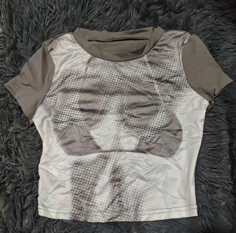 SHEIN ICON BODY MAP HEAT PRINT CROP TEE (Category: Shirts) located in Pasig City. Submitted by love_happybee (Listing ID 1465314963, Image 2). Description: ✨ Trendy SHEIN ICON Gray Body Heat Map Crop Tee ✨ - Brand: SHEIN (Icon line) - Size: XXS on tag (Perfect for true petite/XXS frames, stretchy fabric) - Style: Y2K Aesthetic, Halftone Bikini Graphic, Optical Illusion - Condition: Bale fresh, washed & ready to wear! Super edgy and perfect for ae