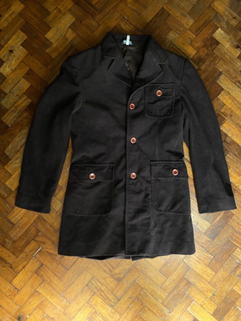 Koshino Paris Brown Button Blazer Jacket (Category: Coats, Jackets and Outerwear) located in Taguig. Submitted by cherylmnl.vintage (Listing ID 1465220415, Image 1). Description: - Brand: Koshino Paris - Color: Dark brown with matching satin lining - Closure: Classic four-button front - Collar: Classic lapel style - Pockets: Multiple functional buttoned front pockets - Fit: Structured and flattering - Interior: Fully lined with premium brown sati