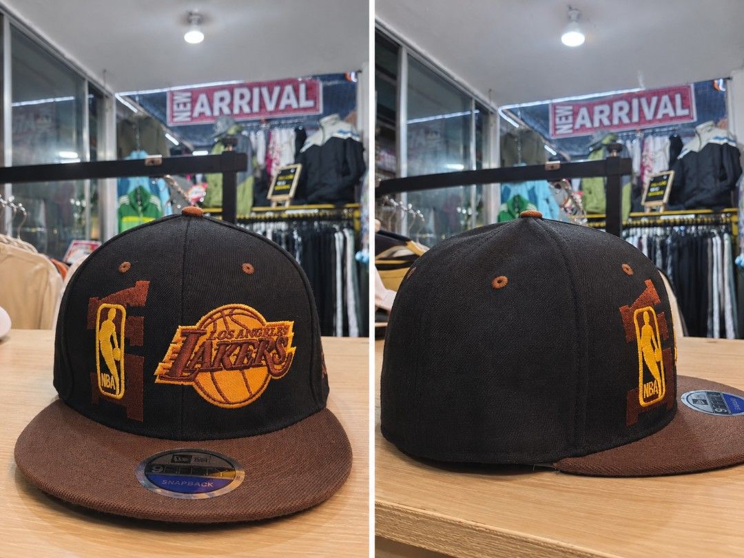 LA Lakers Snapback Cap (Category: Caps & Hats) located in Bulacan. Submitted by annenicathriftthriftlang (Listing ID 1465179104, Image 1). Description: Title: LA Lakers Snapback Cap Black Brown - NBA - Legit Style Description: LA Lakers Snapback - Black/Brown - One Size - No issue - El Camino Meycauayan.