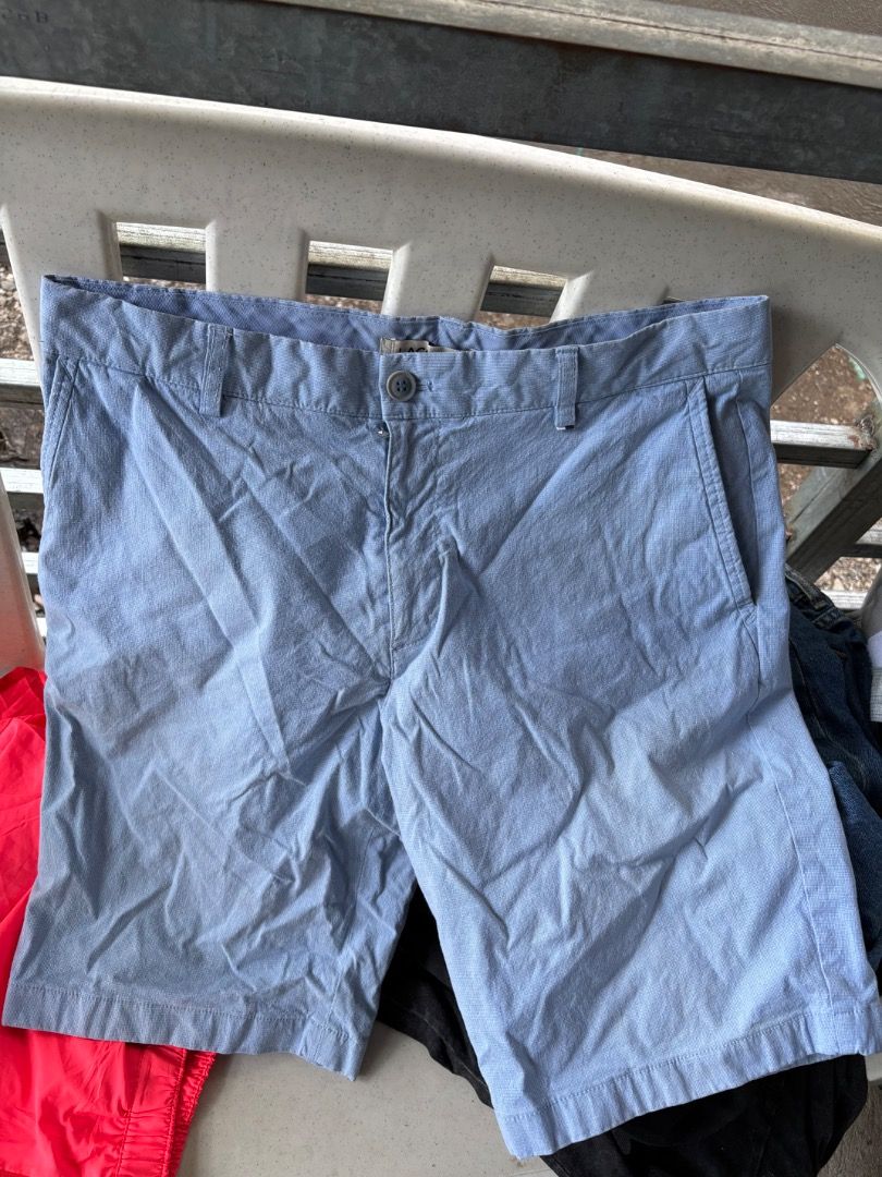 Lacoste light blue casual shorts size 42 (Category: Shorts) located in Danao, Cebu. Submitted by kentoy25 (Listing ID 1465241928, Image 1). Description: - Brand: Lacoste - Color: Light Blue - Size: 42 (tag on back pocket) - Material: Cotton and polyurethane blend - Pockets: Two front pockets, two back welt pockets with button closure - Details: Small embroidered alligator logo on the right back pocket - Style: Casual, ideal for warm weather.
